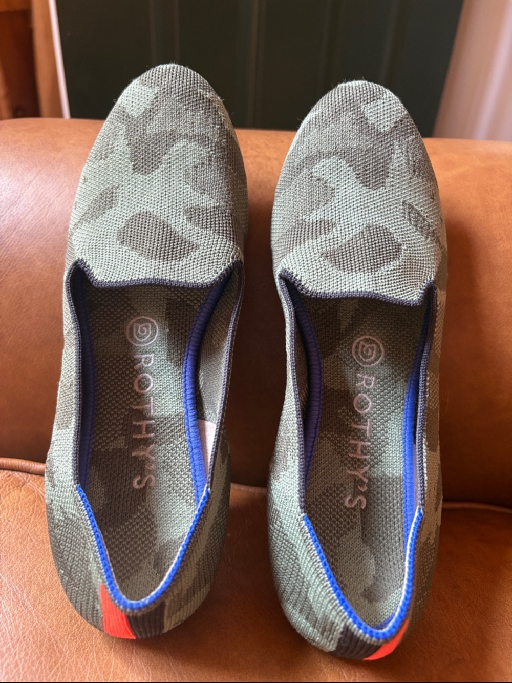 Rothy's Olive Green Camouflage Flats with Blue Trim and Orange Heel Tab